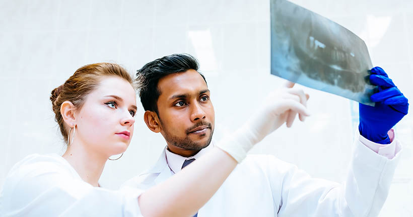 Dental Bridges vs Dental Implants